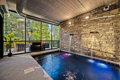 Stunning Luxury Cabin with Unique Furnishings, Indoor Pool, and Game Room in Gatlinburg, Tennessee - Gatlinburg, Tennessee - glamping.directory