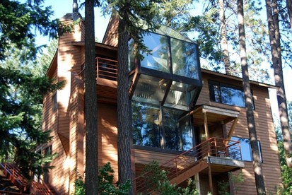 Cozy Lake View Woodland Cabin Rental in Coeur d'Alene, Idaho - glamping.directory