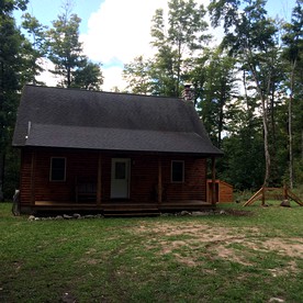 Rustic Log Cabin on the Upper Peninsula in Blaney Park, Michigan - Blaney Park, Michigan - glamping.directory