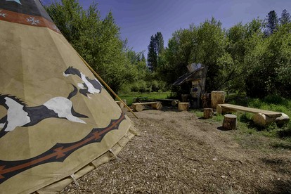Secluded Riverfront Tipi Retreat Surrounded by Pines in Garden Valley Idaho - Garden Valley, Idaho - glamping.directory