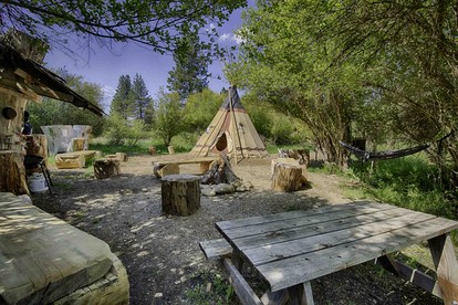 Secluded Riverfront Tipi Retreat Surrounded by Pines in Garden Valley Idaho - glamping.directory