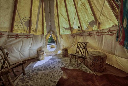 Secluded Riverfront Tipi Retreat Surrounded by Pines in Garden Valley Idaho - Garden Valley, Idaho - glamping.directory