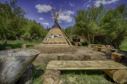 Secluded Riverfront Tipi Retreat Surrounded by Pines in Garden Valley Idaho - Garden Valley, Idaho - glamping.directory