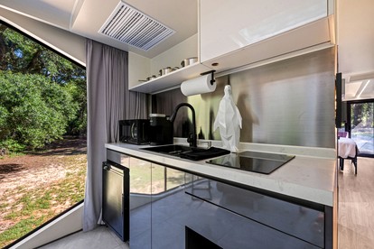Futuristic Pod Glamping Retreat with Pond Views in South Carolina - Saint Stephen, South Carolina - glamping.directory