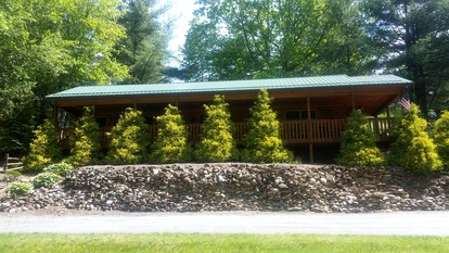 Riverfront Log Cabin Rental near Stone Mountain State Park, North Carolina - Starta, North Carolina - glamping.directory