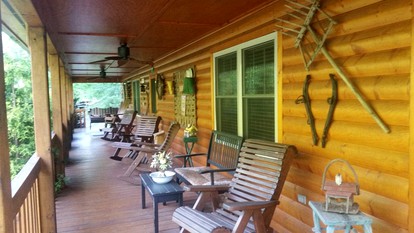 Riverfront Log Cabin Rental near Stone Mountain State Park, North Carolina - glamping.directory