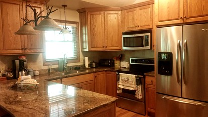 Riverfront Log Cabin Rental near Stone Mountain State Park, North Carolina - Starta, North Carolina - glamping.directory