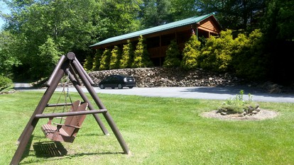 Riverfront Log Cabin Rental near Stone Mountain State Park, North Carolina - Starta, North Carolina - glamping.directory