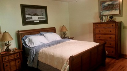 Riverfront Log Cabin Rental near Stone Mountain State Park, North Carolina - Starta, North Carolina - glamping.directory