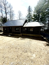 Charming Lakeside Cabin Bungalow with Timeless Rustic Beauty near Portage Lake in Maine - glamping.directory