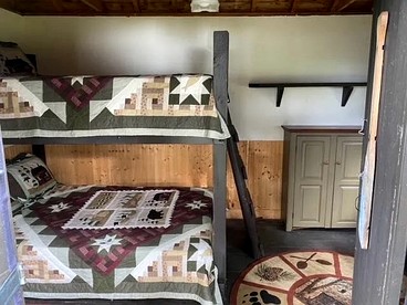 Charming Lakeside Cabin Bungalow with Timeless Rustic Beauty near Portage Lake in Maine - Portage Lake, Maine - glamping.directory