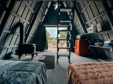 Rustic A-Frame Cabin Near Nashville with Breakfast, AC & Live Music Views - Lebanon, Tennessee - glamping.directory