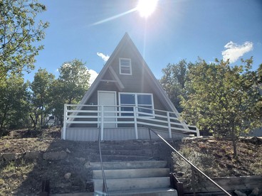 Charming Lakeside Cabin with Fire Pit & Private Dock Near Lake Cisco, Cisco, TX - glamping.directory