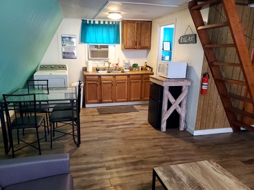 Charming Lakeside Cabin with Fire Pit & Private Dock Near Lake Cisco, Cisco, TX - Cisco, Texas - glamping.directory