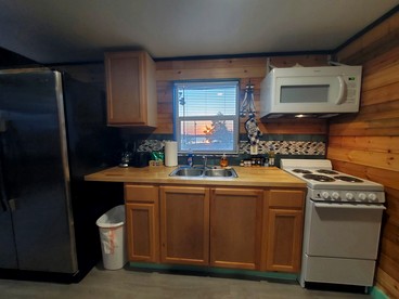 Charming Lakeside Cabin with Fire Pit & Private Dock Near Lake Cisco, Cisco, TX - Cisco, Texas - glamping.directory