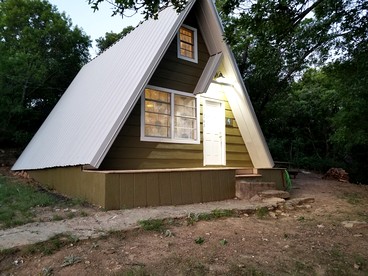 Charming Lakeside Cabin with Fire Pit & Private Dock Near Lake Cisco, Cisco, TX - Cisco, Texas - glamping.directory