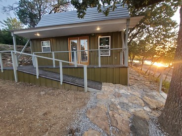 Charming Lakeside Cabin with Fire Pit & Private Dock Near Lake Cisco, Cisco, TX - Cisco, Texas - glamping.directory