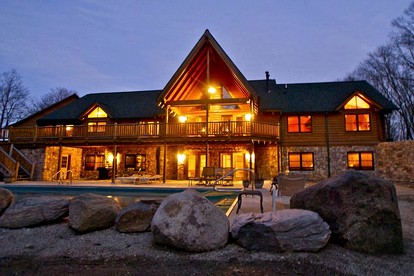 Luxurious Cabin Retreat with Heated Pool and Scenic Creek Views in Wayne Township, IN - glamping.directory