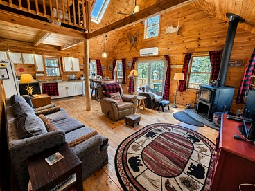 Rustic-Chic Cabin Getaway with Trails, Stream & Peaceful Setting in Shirley, Maine - Shirley, Maine - glamping.directory