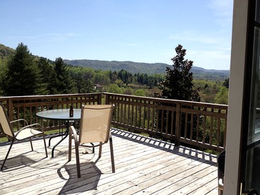 Family-Friendly Cabin with Panoramic Mountain Views next to Pisgah National Forest - Pisgah Forest, North Carolina - glamping.directory