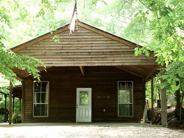 Secluded Forest Cabin Rental with Seasonal Pool near Natchez, Mississippi - glamping.directory