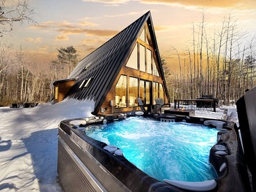 Luxurious A-Frame Retreat with Hot Tub and Fire Pit in Bartlett, New Hampshire - glamping.directory