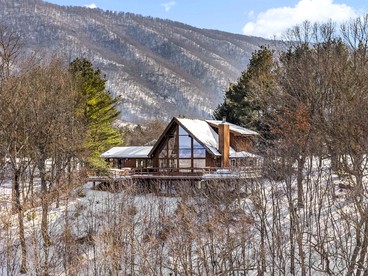 Modern Mountain Cabin with Hot Tub and Game Room Near Moorefield, West Virginia - glamping.directory