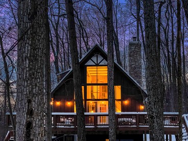 Beautiful A Frame Surrounded by Trees and Fire Pit Provided in Rock Gap, West Virginia - glamping.directory