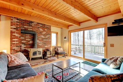 Chic Forest Cabin with Hot-Tub, Deck and Fire Pit in New Hampshire - Intervale, New Hampshire - glamping.directory