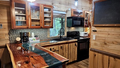 Private Cozy Cabin with Covered Porch in North Carolina - Mill Spring, North Carolina - glamping.directory
