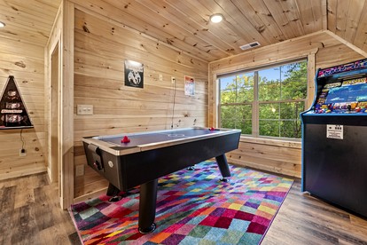 Outstanding Cabin with Air Hockey Table Beautifully Designed in Tennessee - Sevierville, Tennessee - glamping.directory