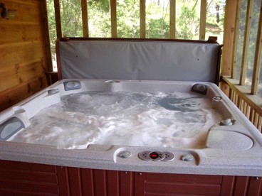 Large Camping Cabin with a Hot Tub near Beech Mountain, North Carolina - Elk Park, North Carolina - glamping.directory