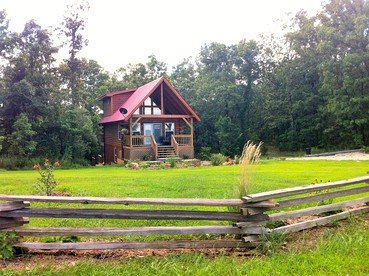 Two-Story Log Cabin Rental with a Hot Tub near Upper Meramec River, Missouri - glamping.directory