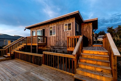Rustic Beachfront Escape with Fireplace, Views & Pet-Friendly Stay in Florence, Oregon - glamping.directory