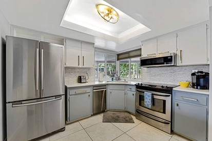 Modern Waterfront Home with Pool, Tesla EV Charger & Canal Fishing near Lauderdale-by-the-Sea Beach, Oakland Park Florida - Oakland Park, Florida - glamping.directory