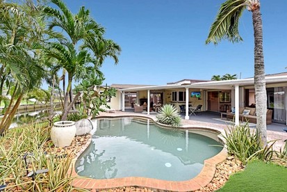 Modern Waterfront Home with Pool, Tesla EV Charger & Canal Fishing near Lauderdale-by-the-Sea Beach, Oakland Park Florida - glamping.directory