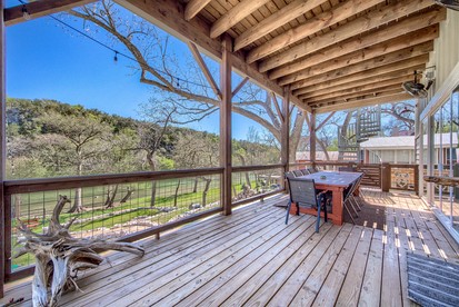 River Cabin Beautifully Design with Fire Pit and Deck in Texas - New Braunfels, Texas - glamping.directory