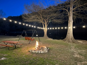 River Cabin Beautifully Design with Fire Pit and Deck in Texas - New Braunfels, Texas - glamping.directory