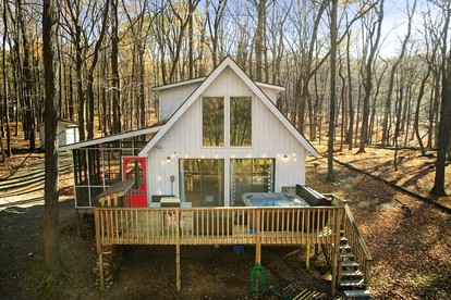 Spacious Chalet Cabin with Hot Tub, Fire Pit and Grill in Rock Gap, WV - glamping.directory