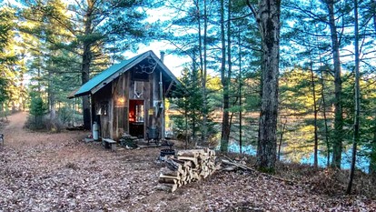 Secluded and Off-Grid, Pet Friendly Cabin on Private Pond in Glenfield, New York - glamping.directory