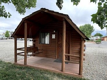 Rustic Extended-Stay Camping Cabin with Scenic Outdoor Amenities near Local Attractions in Fruita, Colorado - Fruita, Colorado - glamping.directory