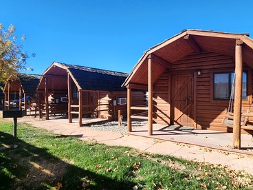 Rustic Extended-Stay Camping Cabin with Scenic Outdoor Amenities near Local Attractions in Fruita, Colorado - Fruita, Colorado - glamping.directory