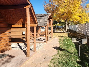 Rustic Extended-Stay Camping Cabin with Scenic Outdoor Amenities near Local Attractions in Fruita, Colorado - glamping.directory