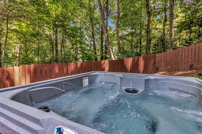 Tranquil Woodland Retreat with Hot Tub and Arcade Games near Black Mountain, NC - Black Mountain, North Carolina - glamping.directory