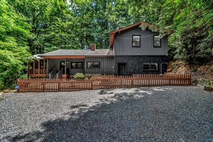 Tranquil Woodland Retreat with Hot Tub and Arcade Games near Black Mountain, NC - glamping.directory
