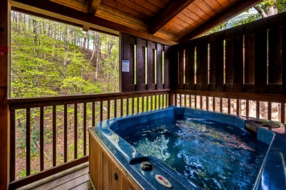 Romantic Smoky Mountain Cabin with Hot Tub, Scenic Views & Game Loft near Pigeon Forge, Tennessee - Pigeon Forge, Tennessee - glamping.directory