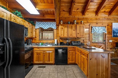 Romantic Smoky Mountain Cabin with Hot Tub, Scenic Views & Game Loft near Pigeon Forge, Tennessee - Pigeon Forge, Tennessee - glamping.directory