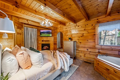 Romantic Smoky Mountain Cabin with Hot Tub, Scenic Views & Game Loft near Pigeon Forge, Tennessee - Pigeon Forge, Tennessee - glamping.directory