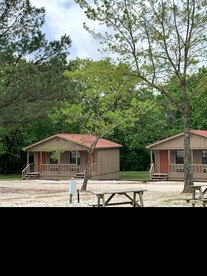 Modern Cabin with Gorgeous Wood Paneled Walls Nestled in the Scenic Beauty of the Ozarks - Mountain View, Arkansas - glamping.directory