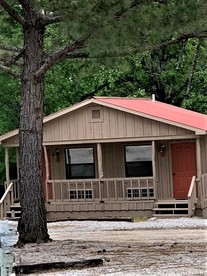 Modern Cabin with Gorgeous Wood Paneled Walls Nestled in the Scenic Beauty of the Ozarks - glamping.directory